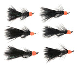 Close-up of egg-sucking leech showing Chenille body and orange tip resembling a fish egg